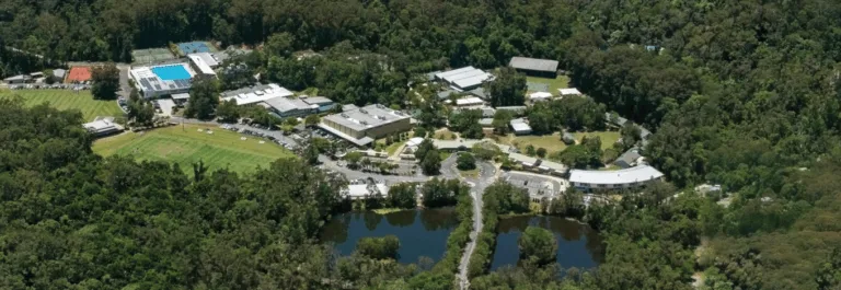 Sunshine Coast Grammar with ocean short 1 1360x470 1
